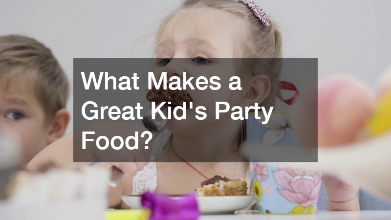 a little girl eating at a party